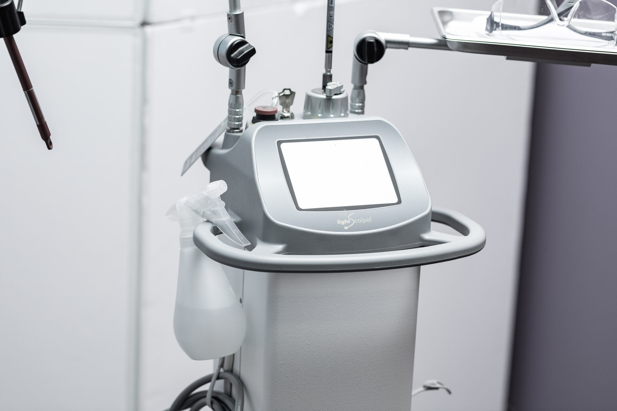  Image of a laser machine with a screen used in a high-tech dental office. 