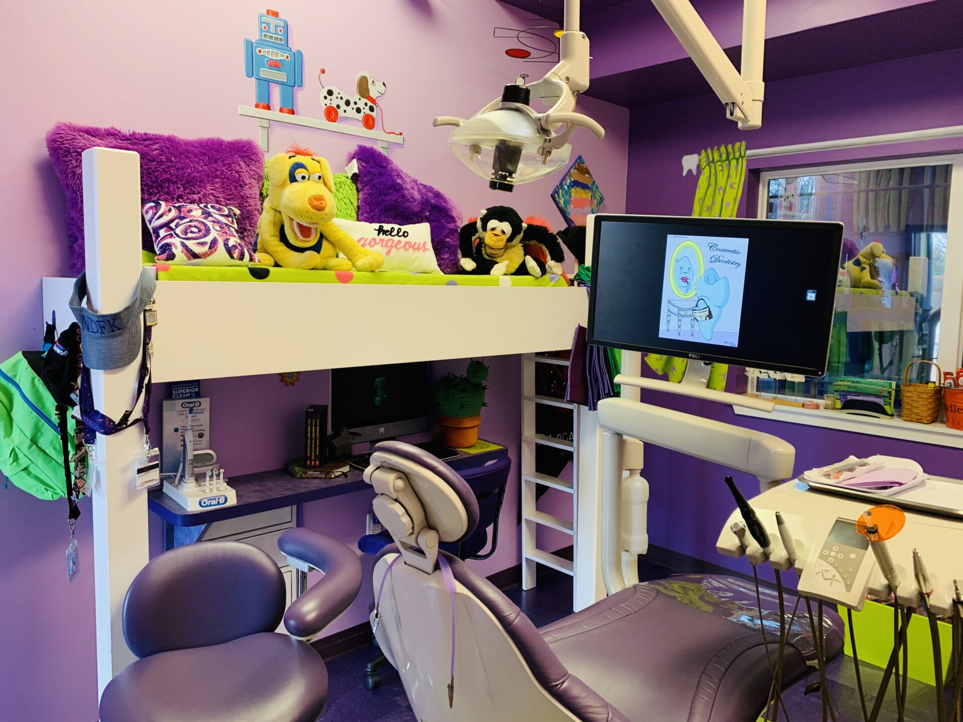 View of bright and fun dental exam room for kids.